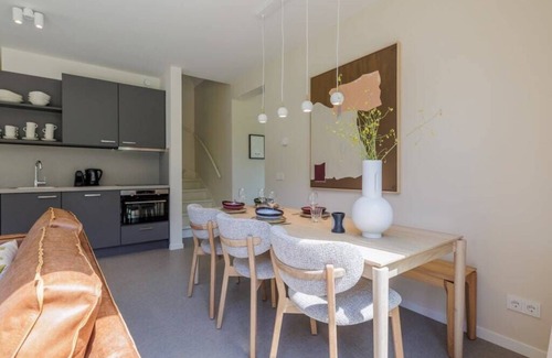 Oude-Tonge House | Stay in comfort in this modern, recently built holiday home with a beautiful view of the water from