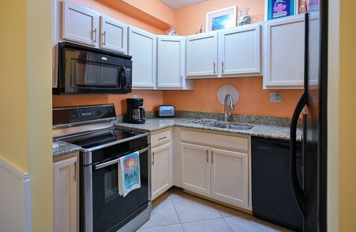 Pensacola Beach Condo | Stay Sans Souci on the beach! Gated property located on Pensacola Beach π