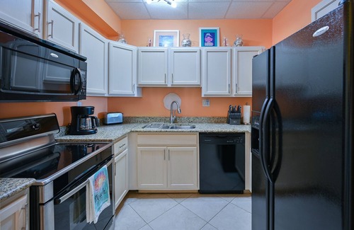 Pensacola Beach Condo | Stay Sans Souci on the beach! Gated property located on Pensacola Beach π