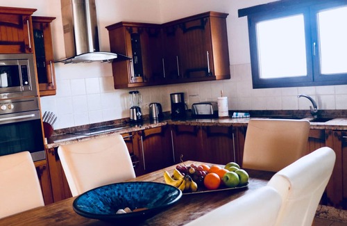 Lajares Villa | StayonBoard: Rustic villa with heated pool, view, patio, wifi, tv, .