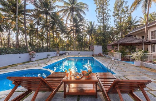 Kushalnagar Villa | StayVista at Bask In The Greens Coorg with Private Pool