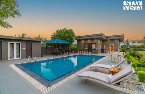 Faridabad Villa | StayVista at Cloudberry Estate - Pet Freindly Villa with Private Outdoor Pool & Lawn
