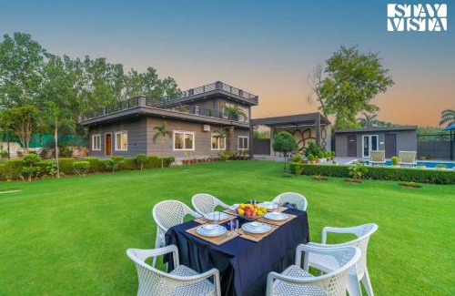 Faridabad Villa | StayVista at Cloudberry Estate - Pet Freindly Villa with Private Outdoor Pool & Lawn