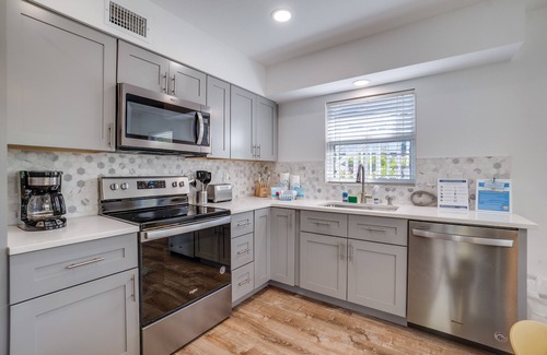 Anna Maria Villa | Steps to Beach - Bean Point Residence Unit B by SeaBreeze Vacation