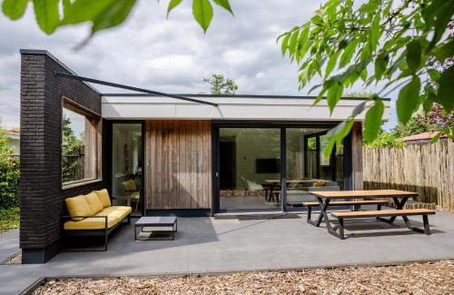 Baarland House | Stijlvol ingerichte (4 pers.) bungalow in Baarland