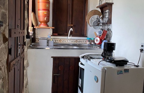 Praia Grande Ski Chalet | Stone Cottage in Pontal do Atalaia