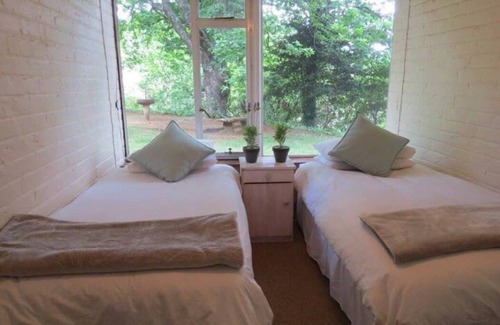 Hogsback House | Stone cottage in the forest; 3 bedrooms. Cozy and family friendly!