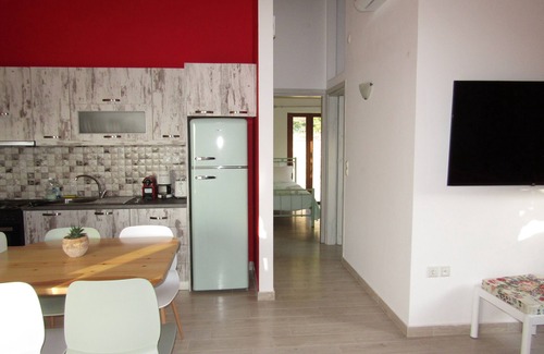 Keryneia House | Stone house with pool and view to the sea