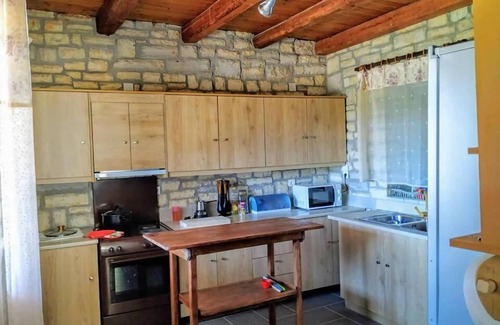 Koumaris Hotel | Stone Maisonettes