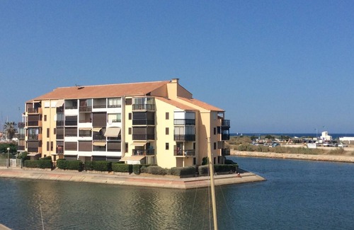 Saint-Cyprien Plage Apartment | Studio air-conditioned cabin 100 m from the beach, with lagoon view, swimming pool