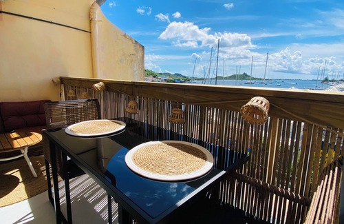 Marigot Apartment | Studio Cocoon, sea and marina view.