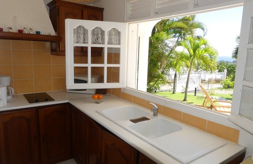 Capesterre-Belle-Eau Apartment | Studio South East, large terrace facing the sea in tropical garden.