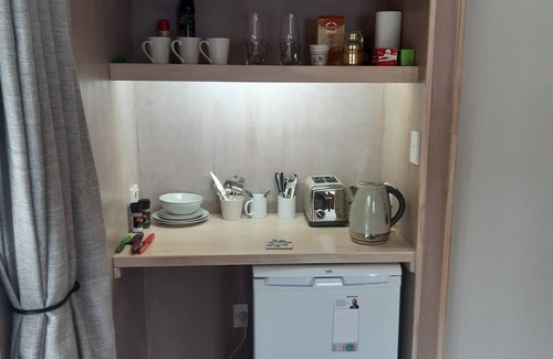 Raumati Beach Apartment | Studio steps away from Raumati villiage, and short walk to beach