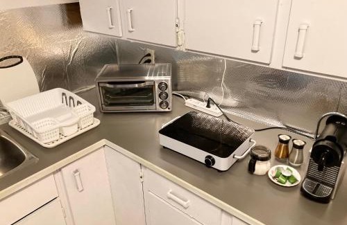 Sunset Apartment | Studio Suite with private Living room at semi-basement