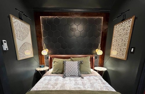 Buechel Apartment | Studio suite with secret movie room! Sleeps 4.