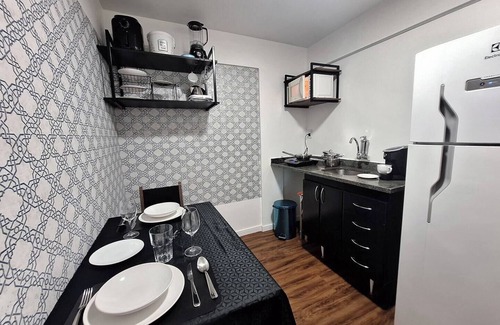 Asa Norte Apartment | Studio Tipuana open balcony with hammock