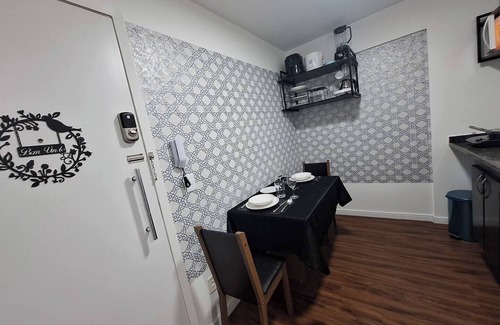 Asa Norte Apartment | Studio Tipuana open balcony with hammock