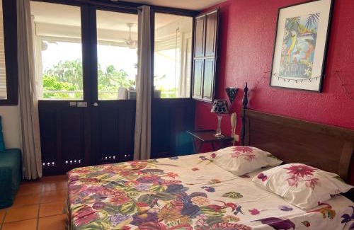 Grande-Terre Apartment | Studio Vue mer Haut de villa anse des rochers