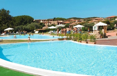 Baia Caddinas Apartment | Studio with shared pool and close to the beach in Golfo Aranci