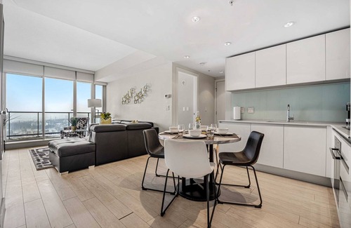 Victoria Park Condo | Stunning 34th Floor Views, PRIME Location, FREE Banff Pass, Parking, Wine!