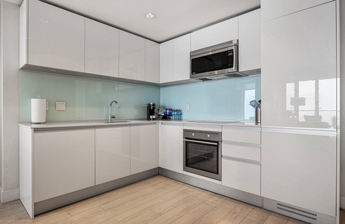 Victoria Park Condo | Stunning 34th Floor Views, PRIME Location, FREE Banff Pass, Parking, Wine!