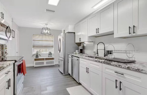 Sandalfoot Cove House | Stunning 4-Bedroom House with Private Saltwater Pool in Sunny South Florida