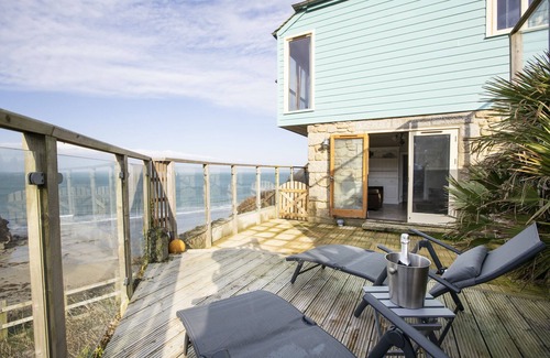 Portreath House | Stunning front line Beach House with incredible sea views, parking & garden