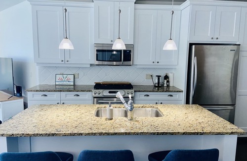 Westbank Condo | Stunning Lakefront Condo on the Beach - View, Pool, Hot Tub, Beach