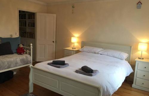 Topsham House | Stunning Town house with parking, fire, games room