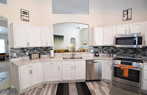 West Haven House | Stunning Updated 4 bed/3 bath pool home, west-facing pool, Disney World 11 miles