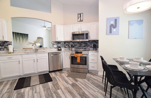 West Haven House | Stunning Updated 4 bed/3 bath pool home, west-facing pool, Disney World 11 miles