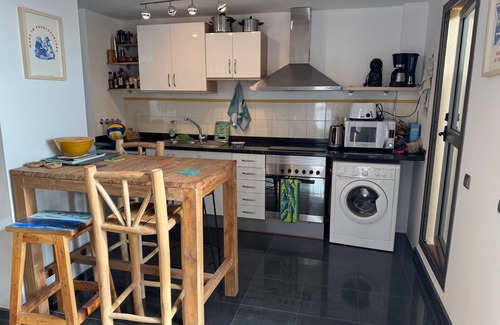 Los Lagos Apartment | Stunning views & location. Spacious 1 bed apartment directly on beach El Cotillo