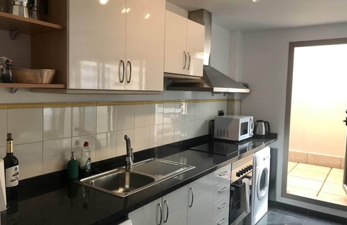 Los Lagos Apartment | Stunning views & location. Spacious 1 bed apartment directly on beach El Cotillo