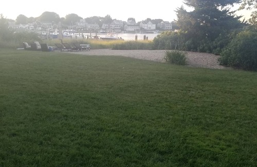 Hyannis House | Stunning waterfront with sandy beach & dock walking distance to top restaurants!