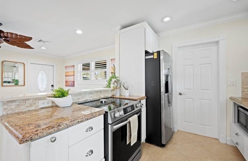 Tequesta House | Stylish 2-Bedroom, 2-Bathroom Home with Heated Pool – Just Steps from the Beach!