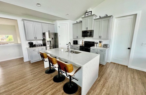 Point Venture House | Stylish and spacious, open concept home with great patio and views of the lake.