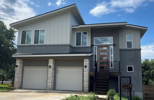 Point Venture House | Stylish and spacious, open concept home with great patio and views of the lake.