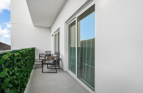 Parkside Apartment | Stylish Condo, Walk to Dining, 5 Min to Beach