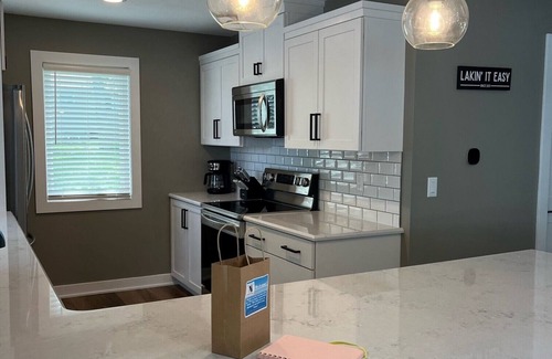Spirit Lake Cabin | Stylish, Fully Renovated Lakefront Home on East Lake Okoboji with Private Dock!