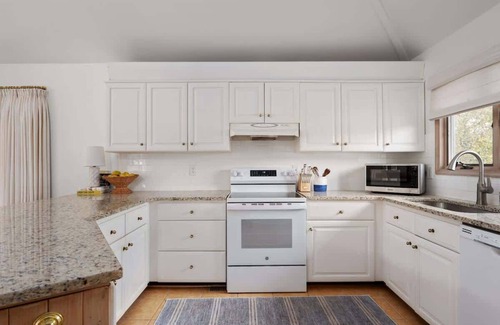 Duck House | Stylish Home with Pool, Hot Tub & Walk to Beach