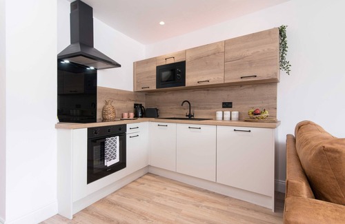 Rugby Apartment | Stylish Ibiza Style Apartment with Private Entrance + Patio Area
