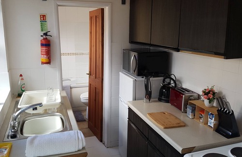 Norwich Apartment | Stylish living with considered workspace.