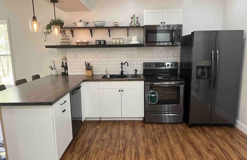 Bushkill House | Stylish retreat w/private hot tub, amenity filled community + seasonal stream