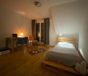 Zug House | Stylish Room and private bathroom in lakefront apartment