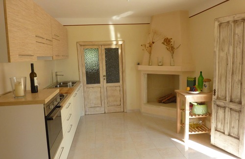 San Pietro in Bevagna House | Stylish villa with beautiful views from the roof terrace over olive groves to the sea