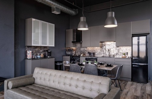 West Main Historic District Condo | Suite 7 City Loft Escape with River Views! By Hollyhock