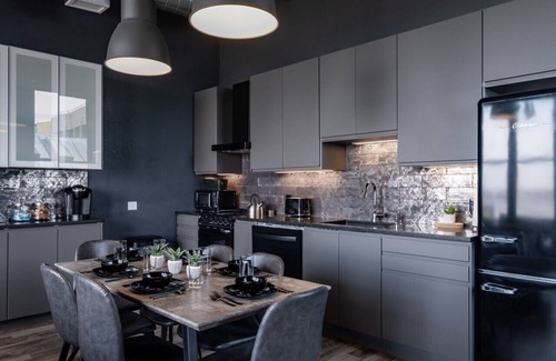 West Main Historic District Condo | Suite 7 City Loft Escape with River Views! By Hollyhock