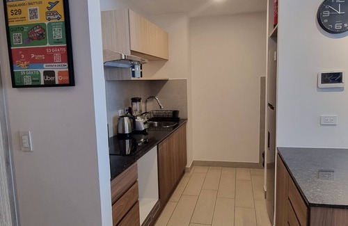 Quito Apartment | Suite La Martina Quito, 2 Personas en La Carolina ¡A 5 Minutos del Metro!