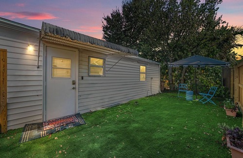 Parrot Cove House | Sunny 2-bedroom Beach Bungalow in Lake Worth Beach just steps from the ocean!