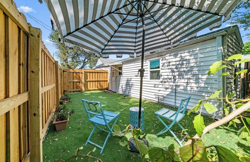 Parrot Cove House | Sunny 2-bedroom Beach Bungalow in Lake Worth Beach just steps from the ocean!
